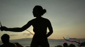 She puts on a show for all at the nude beach